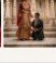 Groom kneeling in palace courtyard ceremony