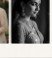 Black and white candid documentary portrait of smiling bride